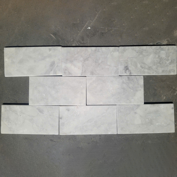 Đá trong nước mài bóng 15×30 hoa mai 01